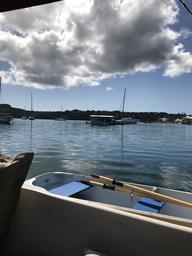 The little blue houseboat moored in the harbor called the Hideaway.  Best fish and chips this side of the equator. 