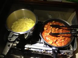 Pasta on the left. Sauce with spicy Italian sausage on the right.