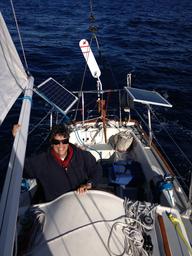 Rosie in the cockpit. Notice we're still in lots of clothes searching for the warmer weather.