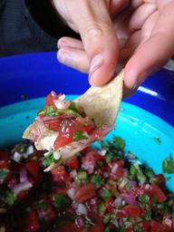 Salsa served up on a chip.