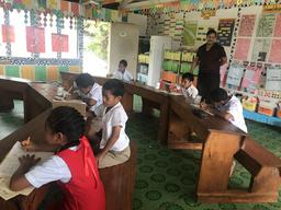 Matamaka school kids in class. Rosie asked before taking this one.