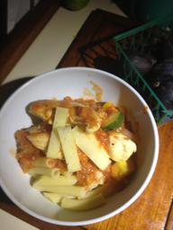 Asiago cheese shaved with the veggie peeler on top.