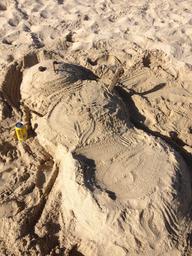 Chris and Carol made this nice snowman just above the surf line in front of the hotel.