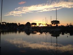 Sunset from the deck of Crazy Love tied to the loading dock in Haleiwa Small Boat Harbor.